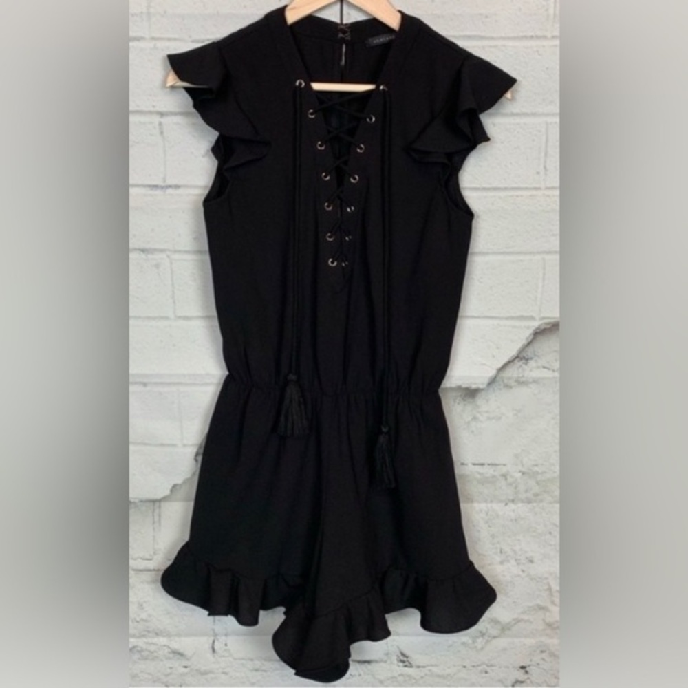 Black Ruffle Romper
Endless Rose
Lace Up in Elegance
Sz Small
Like New